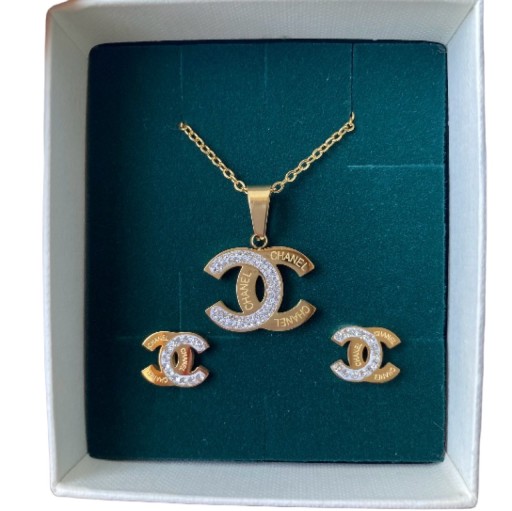 Zdjęcie oferty: Komplet naszyjnik i kolczyki Logo cyrkonia złoto