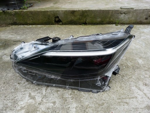 Zdjęcie oferty: Toyota Yaris Cross lampa reflektor 0D-322 lewa Bardzo Dobra