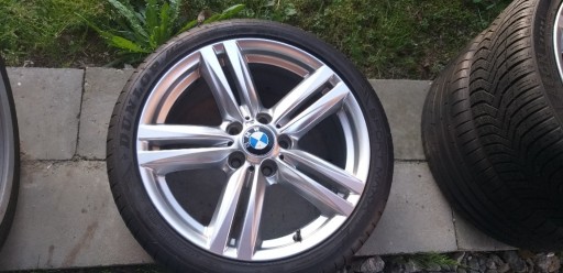 Zdjęcie oferty: oryginalny komplet felg z oponami do BMW 18"