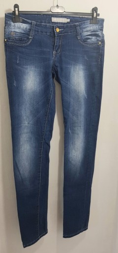 Zdjęcie oferty: Jeansowe spodnie z przetarciami firma Diker Jeans 