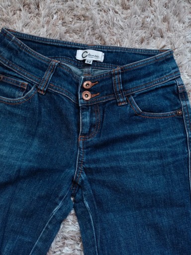 Zdjęcie oferty: Spodnie jeansy damskie denim rozmiar 32