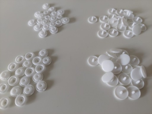 Zdjęcie oferty: Zatrzaski plastikowe, napy do ubrań białe 12,5 mm