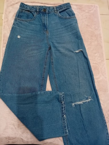 Zdjęcie oferty: Szerokie spodnie z przetarciami jeans 164/170 