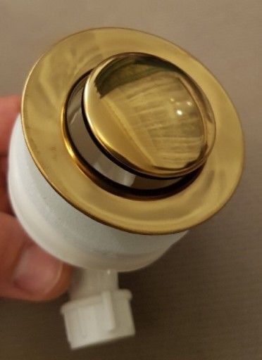 Zdjęcie oferty: Odpływ do umywalki korek automatyczny złoty ferro