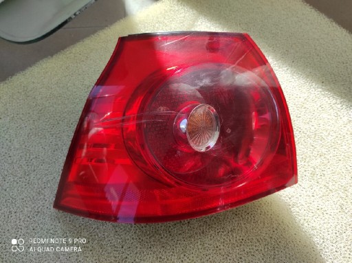 Zdjęcie oferty: Lampa tylna lewa Volkswagen Golf V 1K6945095N