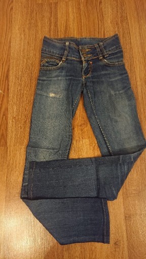 Zdjęcie oferty: Spodnie jeansowe rozmiar 146-152 
