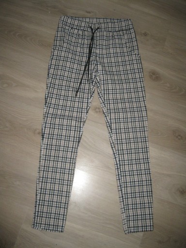Zdjęcie oferty: Spodnie damskie krata wiązane kieszenie rozmiar S