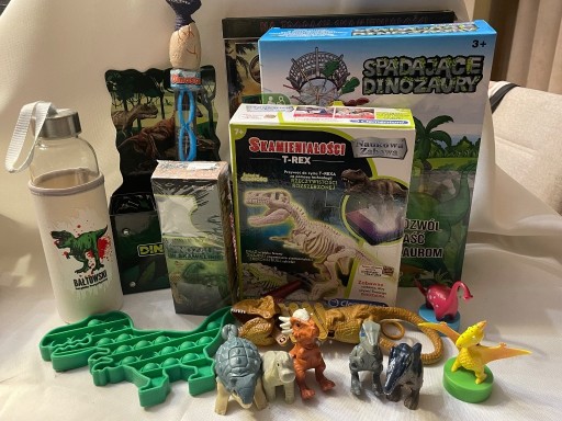 Zdjęcie oferty: zestaw zabawek z dinozaurami skamieliny gra bidon figurki