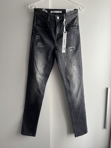 Zdjęcie oferty: Nowe spodnie jeansowe szare z dziurami 27 s