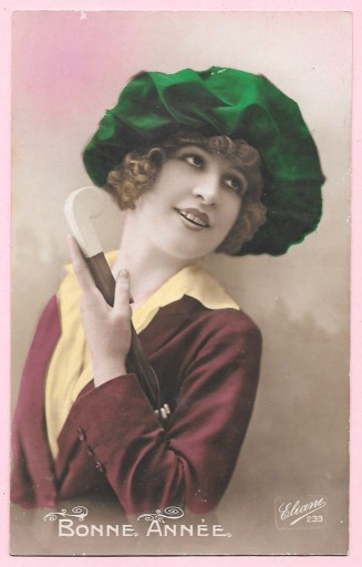Zdjęcie oferty: Elegancka kobieta w zielonym kapeluszu ...