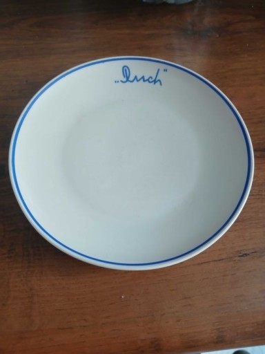 Zdjęcie oferty: Stary talerz porcelit z logo Ruch sygnowany Pruszków