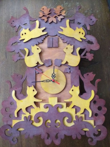 Zdjęcie oferty: Zegar drewniany z motywem kotów