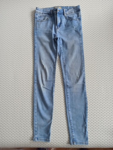 Zdjęcie oferty: Spodnie jeansy Sinsay r.36 z dziurami