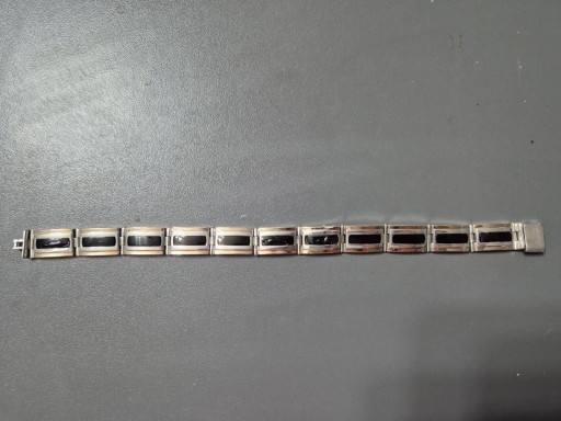 Zdjęcie oferty: Bransoletka srebrna ze złotymi wstawkami i onyksem.