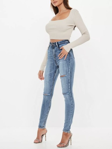 Zdjęcie oferty: Missguided jeansy z wysokim stanem z dziurami 36