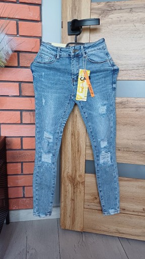 Zdjęcie oferty: M.Sara nowe spodnie jeansowe z przetarciami 34 XS