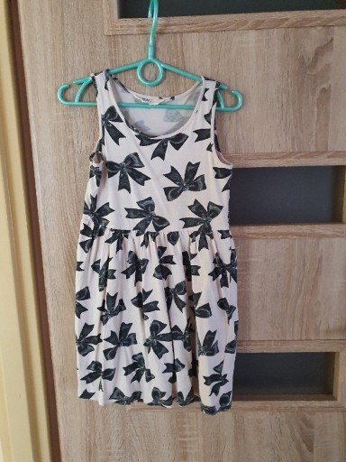 Zdjęcie oferty: Sukienka beżowa w kokardki H&M roz. 110/116