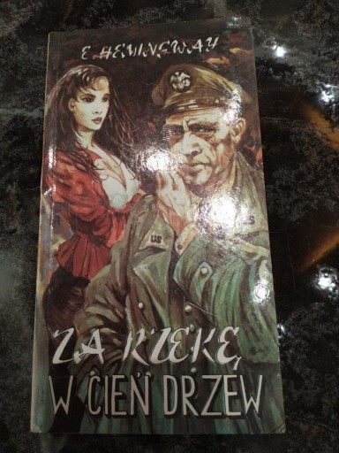 Zdjęcie oferty: E.Hemingway Za rzekę, w cień drzew