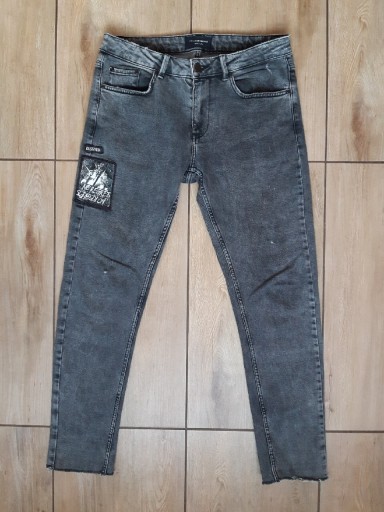 Zdjęcie oferty: Rockowe spodnie męskie: Jeansy Reserved 32/32