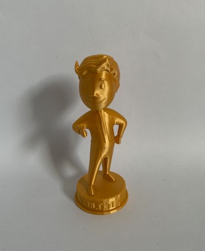 Zdjęcie oferty: Złoty Vault Tec Boy figurka Fallout druk 3D 11cm