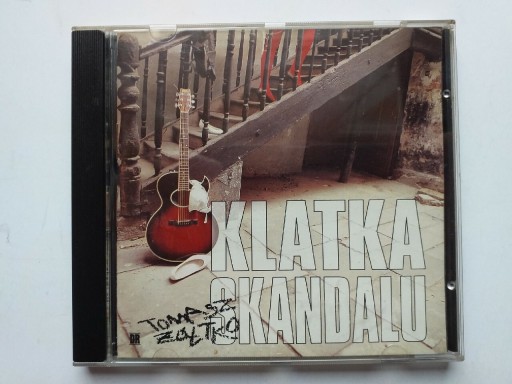 Zdjęcie oferty: ŻÓŁTKO TOMASZ KLATKA SKANDALU CD wyd. I 1994