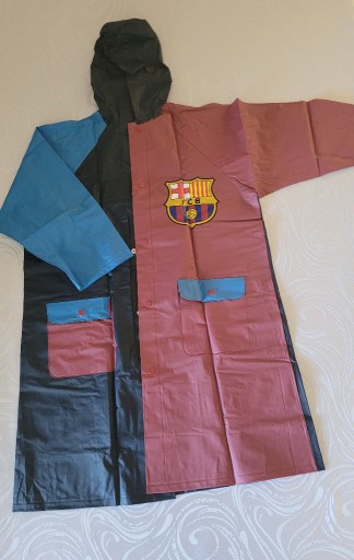 Zdjęcie oferty: Płaszcz przeciwdeszczowy dziecięcy Barcelona