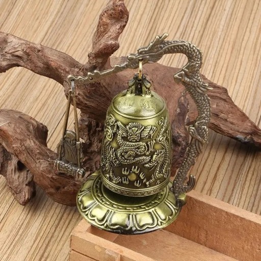 Zdjęcie oferty: Metalowy dzwonek, rzeźbiony smok, zegar buddyjski.