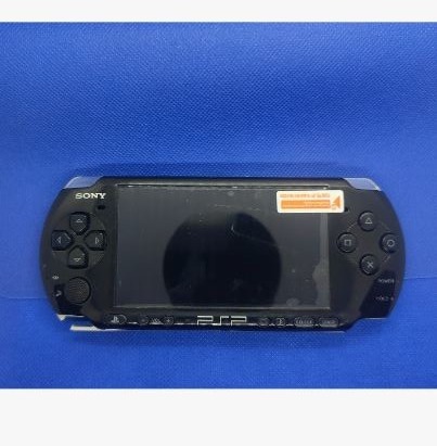 Zdjęcie oferty: Psp 3004 zestaw  Ładowarka + 2 gry