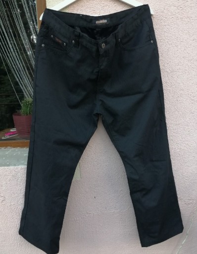 Zdjęcie oferty: Czarne spodnie materiałowe z szeroką męskie 