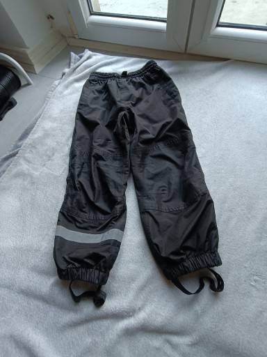 Zdjęcie oferty: Spodnie przeciwdeszczowe czarne 122/128