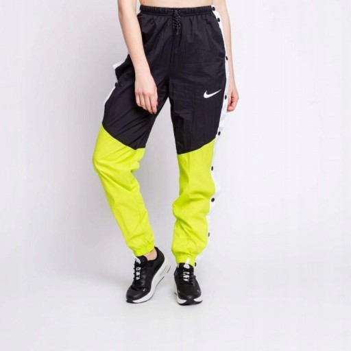 Zdjęcie oferty: Spodnie dresowe Nike neon zatrzaski rozpinane 