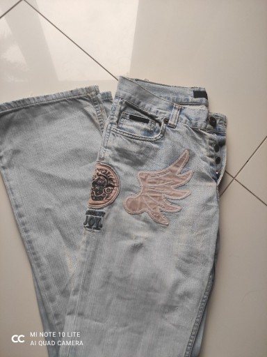 Zdjęcie oferty: Jeansy rozm 32