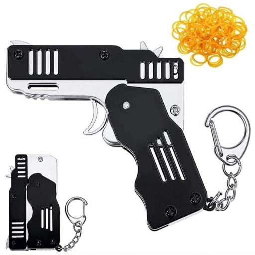 Zdjęcie oferty: Metalowy składany pistolet brelok na gumki zabawka
