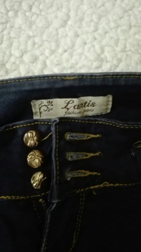 Zdjęcie oferty: Spodnie jeansy niebieskie granatowe kokardki rurki