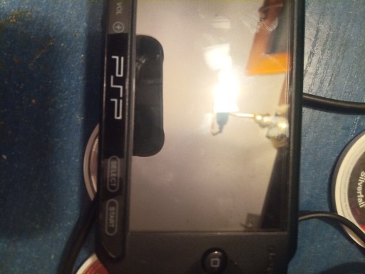 Zdjęcie oferty: Zestaw PSP,kabel,karty pamięci,gry.