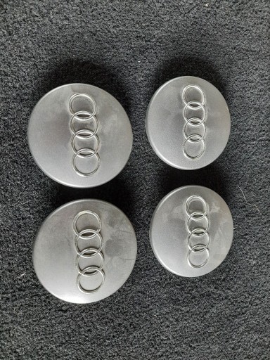 Zdjęcie oferty: Dekielki kapsle Audi 68mm oryginalne