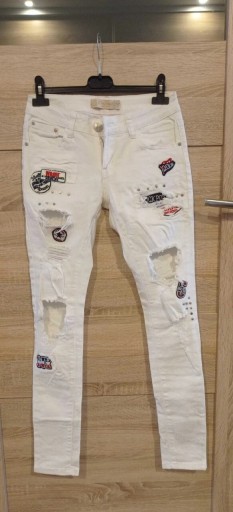 Zdjęcie oferty: Spodnie białe, dziury, z Niemiec, nowe, r. XS-S