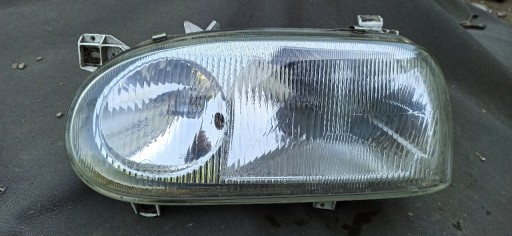 Zdjęcie oferty: Reflektor VW Golf 3, lampa przednia lewa