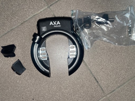 Zdjęcie oferty: Blokada AXA Defender z zamkiem baterii