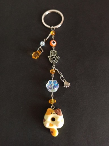 Zdjęcie oferty: Brelok kot donut pączkot pomarańczowy rudy łapka totem