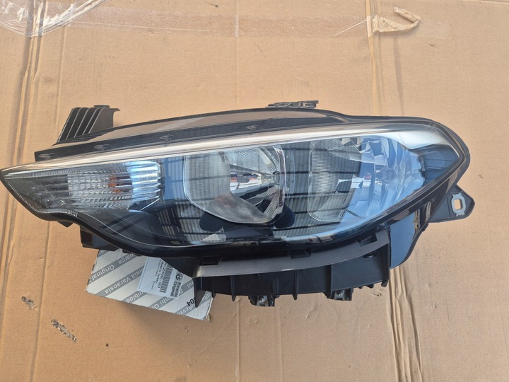 Fiat Tipo 2 lampa lewa.OE MOPAR. Zwykła H-15 H7