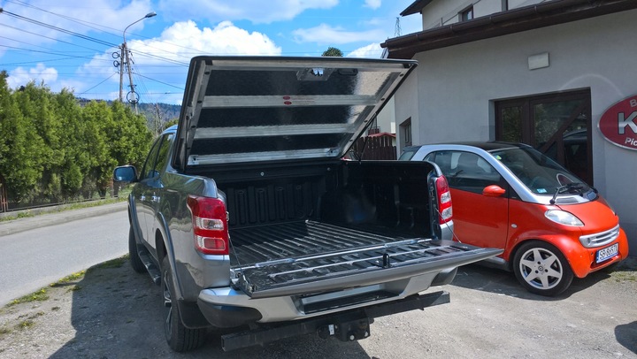 MITSUBISHI L200 MONTAJE RECUBRIMIENTO CAJAS CABINA 