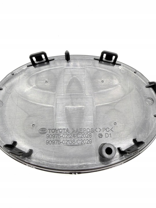 EMBLÈME DANS GRILLE SOUS RADAR TOYOTA COROLLA HYBRID XII E21 19-25 90975-02124