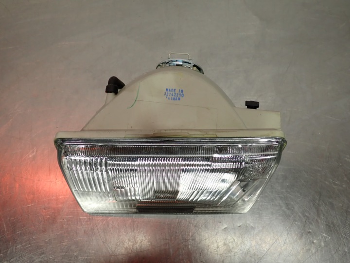 PHARE GAUCHE AVANT JEEP GRAND CHEROKEE I