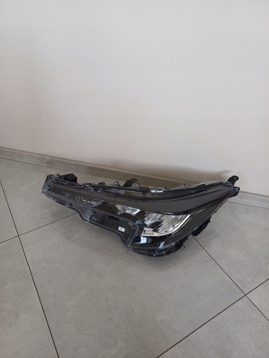 PHARE GAUCHE AVANT AVANT TOYOTA COROLLA E21 XII 81150-02S60 90154118