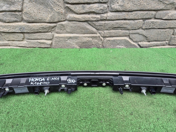 HONDA E:NY1 24- PHARE AVANT AVANT VERS CONDUITE DIURNE K1681T0