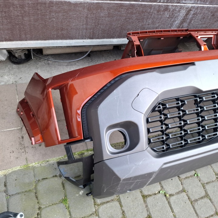 DACIA DUSTER III 24- PARE-CHOCS AVANT AVANT GRILLE ANGLE PLAQUE PDC