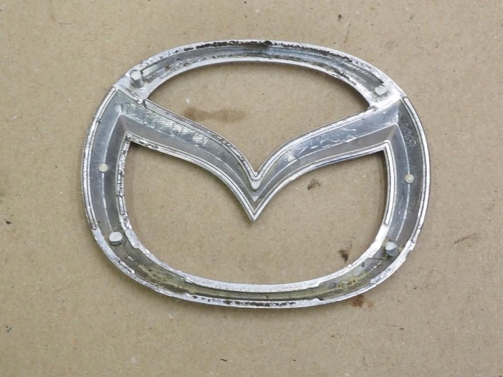MAZDA MX-5 NB RESTYLAGE NBFL 2001- EMBLÈME LOGO PARE-CHOCS AVANT