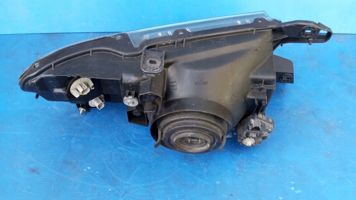 PHARE GAUCHE AVANT EUROPE MITSUBISHI PAJERO III 2000-2006 100-87420 BONNES CONDITIONS ORIGINAL