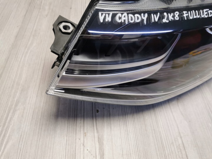 PHARE GAUCHE AVANT VW CADDY IV 2K8 2K8941035R BONNES CONDITIONS